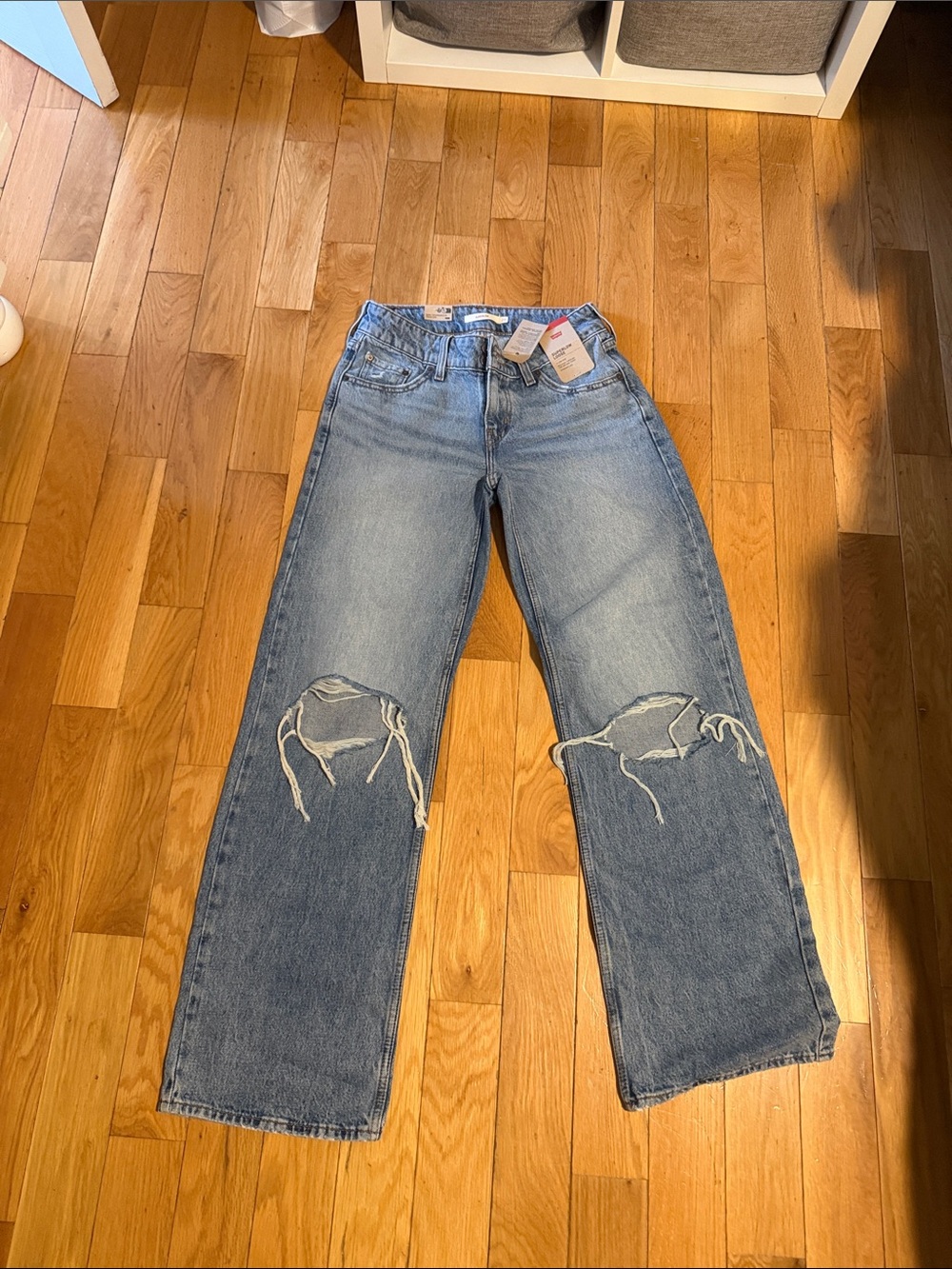 Levi's Women's Light Blue Straight Leg Jeans with Knee Rips